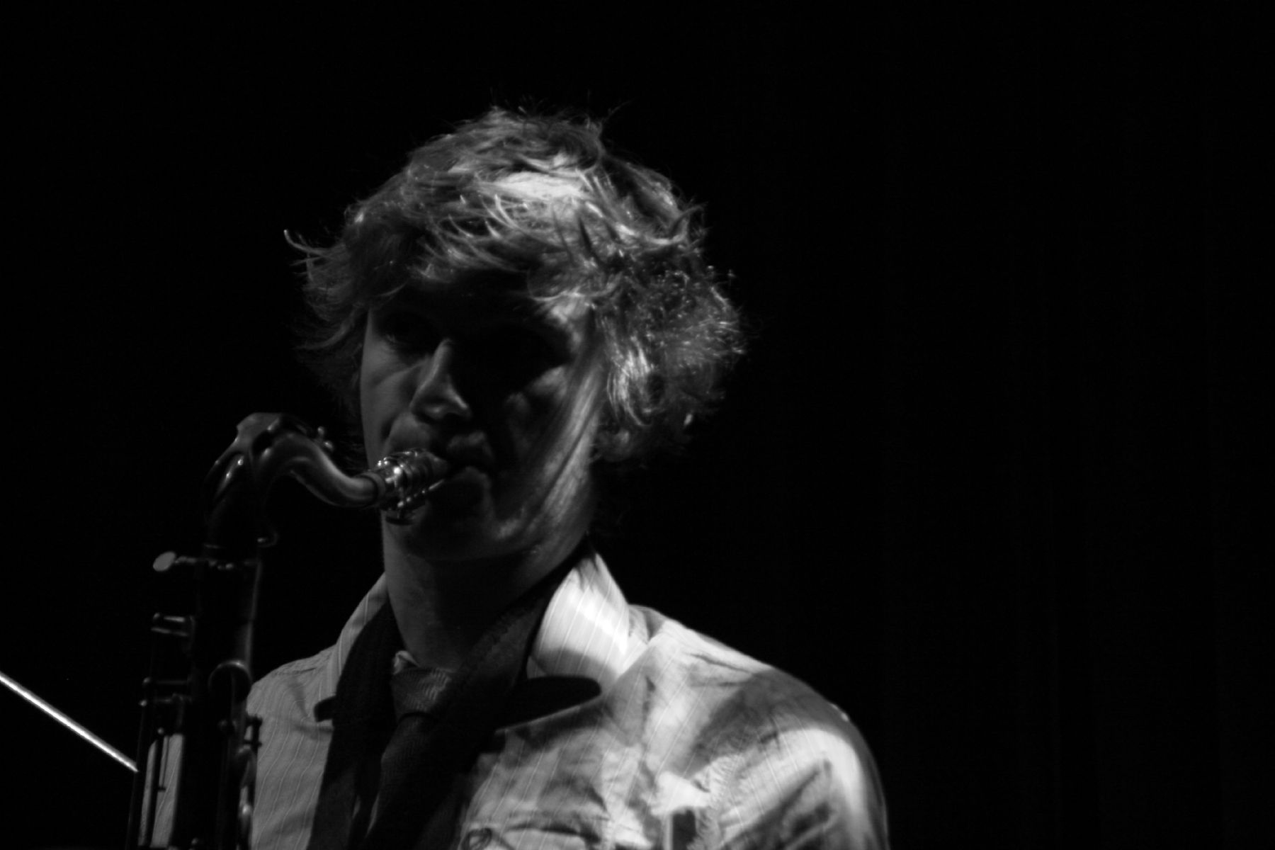  Black and white image of student playing a saxophone